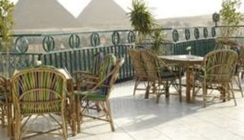 Info - PYRAMIDS PLAZA HOTEL