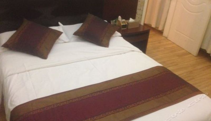 Vierbettzimmer - Kaixuan Hotel