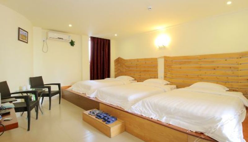 Dreibettzimmer - Longfu Holiday Hotel