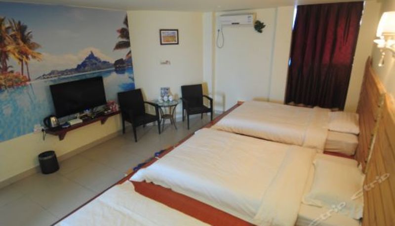 Dreibettzimmer - Longfu Holiday Hotel