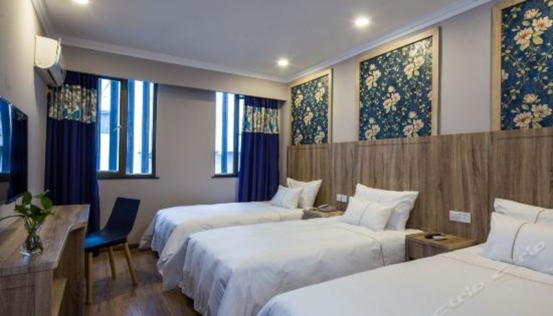 Pokój trzyosobowy - Grand Jiankang Hotel