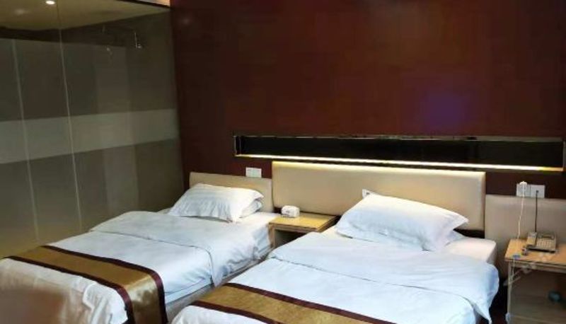 Habitación de categoría superior - Huada Hotel