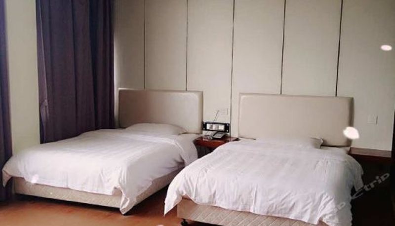 Habitación de categoría superior - Huada Hotel