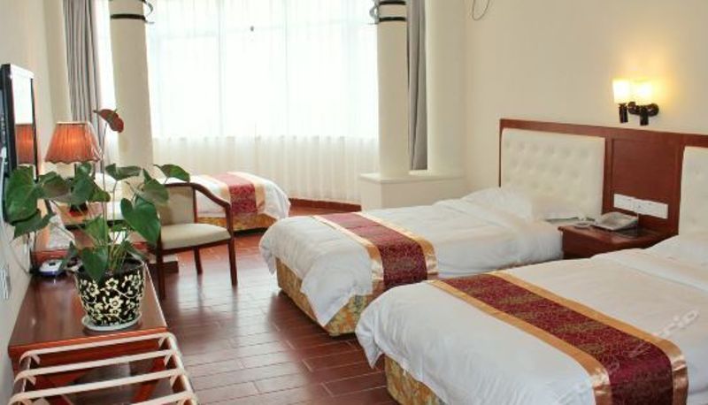 Pokój trzyosobowy - The New Huikang Hotel