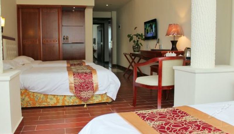 Dreibettzimmer - The New Huikang Hotel