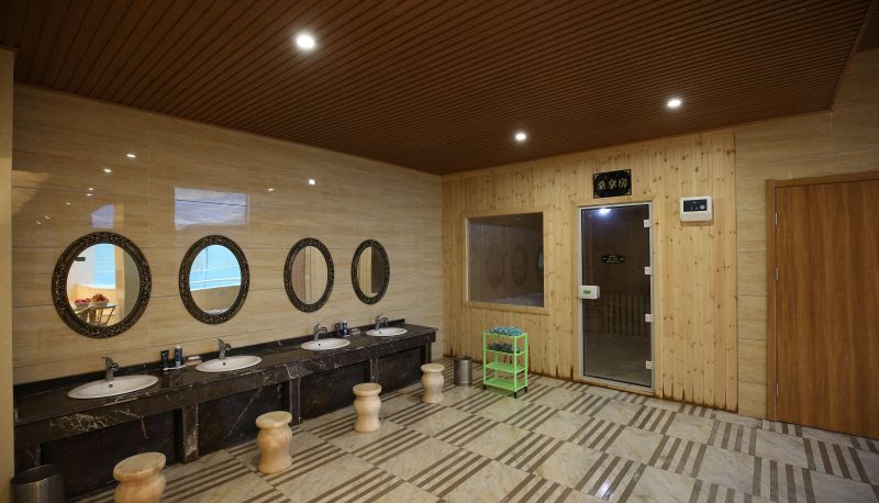 Area esterna dell'hotel - Golden Apple Hot Spring Holiday Hotel (Fangte Lvbo Store)