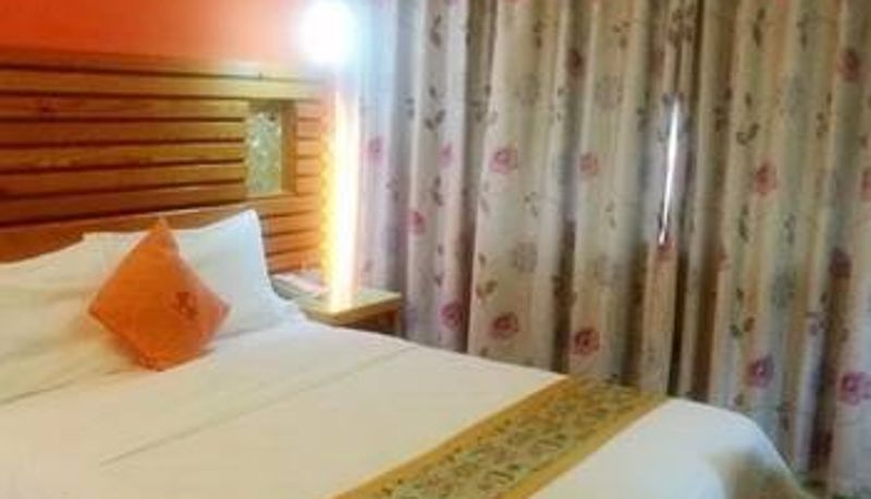 Zimmer - Baoxuan Hotel