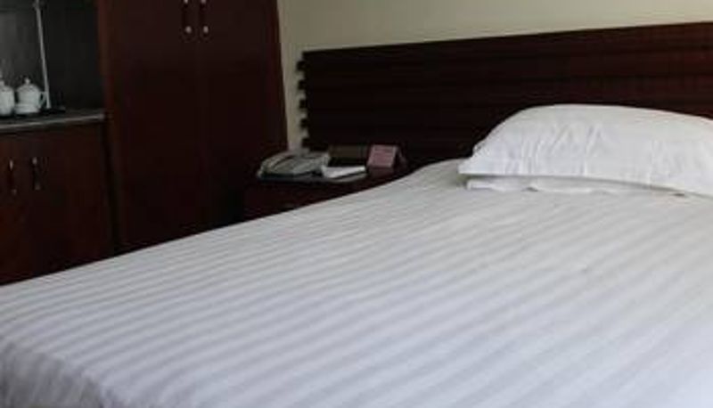 Zimmer - Rifa Apartment Hotel - Shaoxing