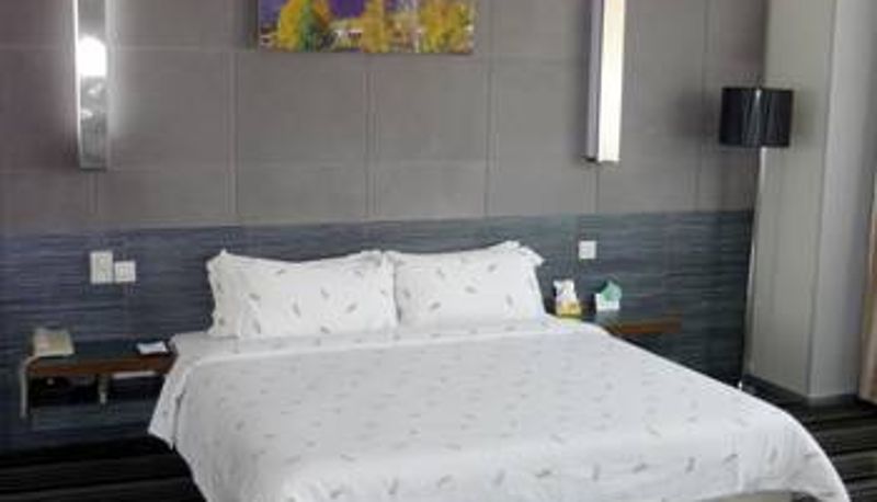 Chambre - King Home Hotel