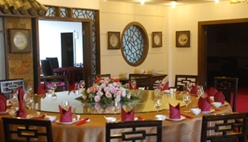 Sala de desayunos dentro del restaurante - Jingui Gongguan Hotel - Chengdu