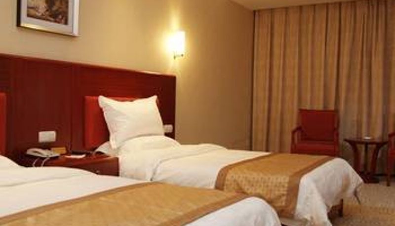 Habitación - Jiaxin Guohua Hotel