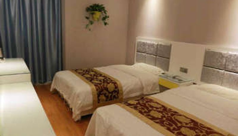 Kamer - Xinbang Business Hotel (Zhongyuan Expo Center Store)