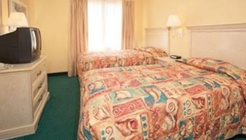 Chambre - ENCLAVE SUITES