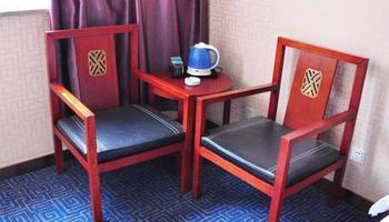 Zimmer - Xiyi Business Hotel (Wanda Plaza Store)
