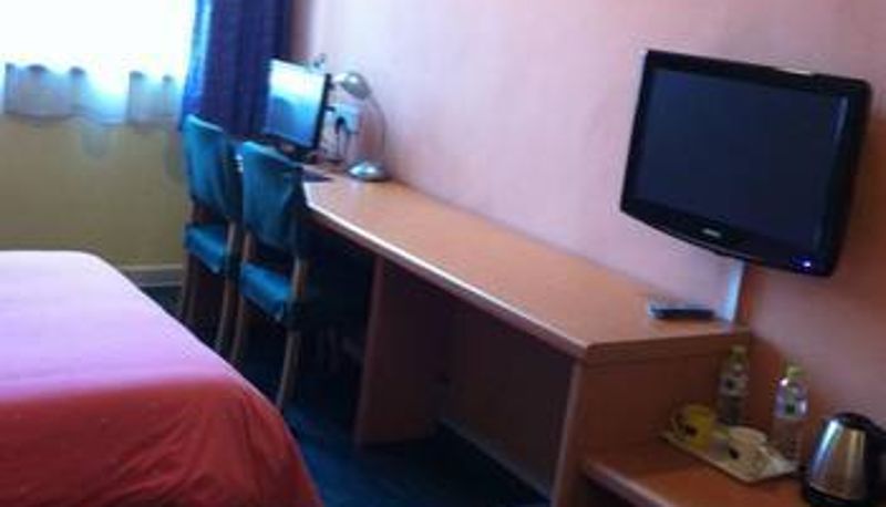 Habitación - Home Inn Hotel