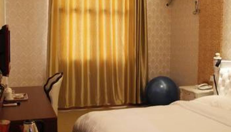Chambre - Oriental Garden Hotel