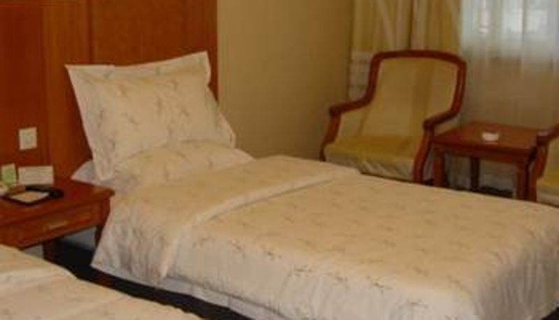 Zimmer - Huaqiao Hotel