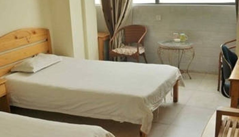 Außenansicht - Junyi Hotel Apartments Luoyang Wanguo Yinzuo Branch
