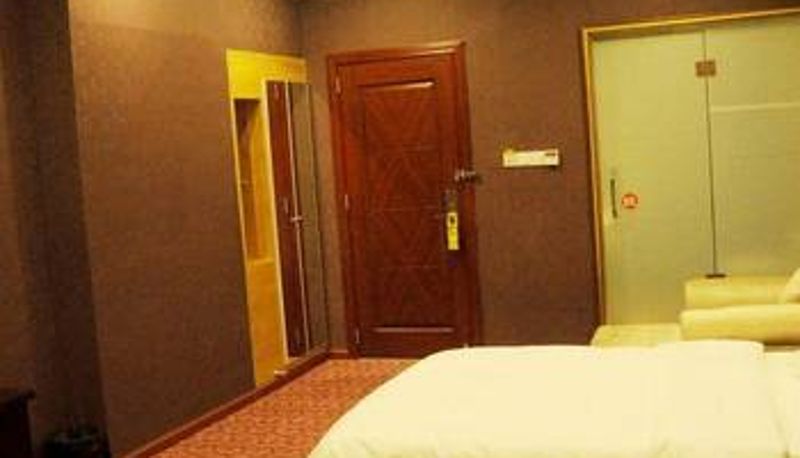 Chambre - Junyi Sunshine Hotel