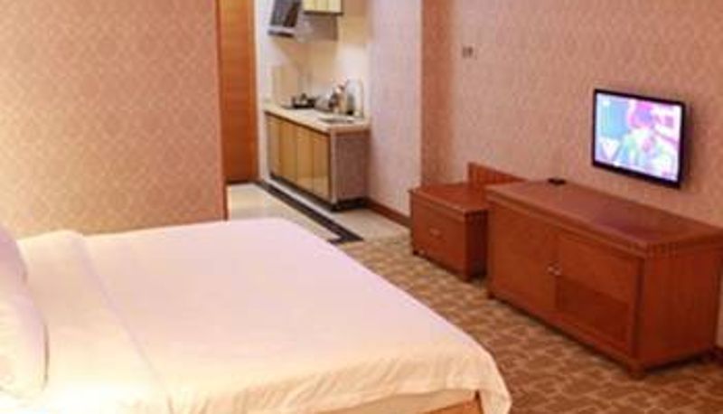 Habitación - Junyi Kaidi Hotel