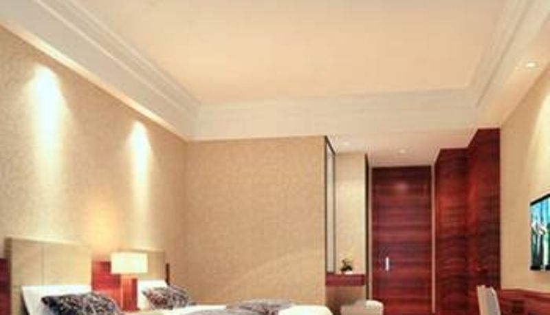 Habitación - Junyi Kaidi Hotel