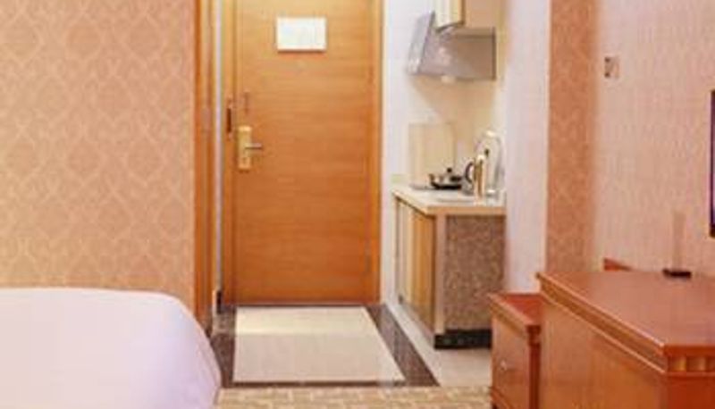 Habitación - Junyi Kaidi Hotel