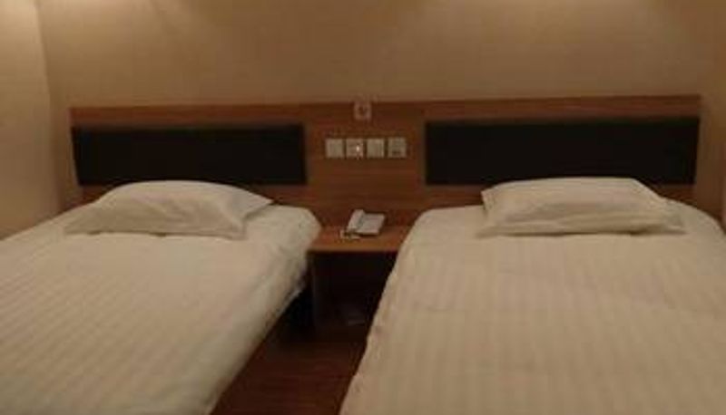 Zimmer - Yijia Holiday Inn (Liuyuan Subway Station Store)