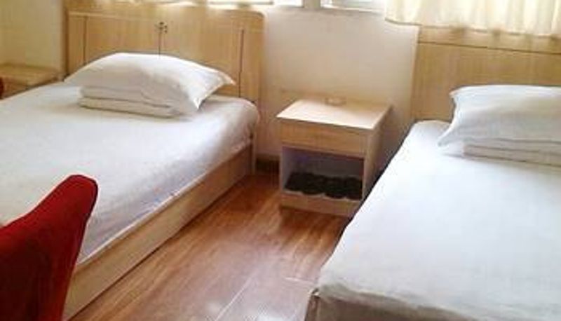 Zimmer - Wanda Yixiu Business Hotel