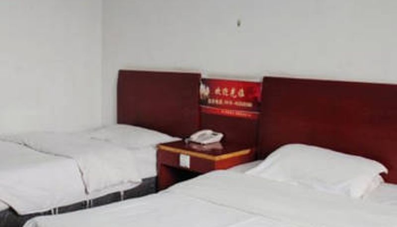 Chambre - Xinshiji Hotel