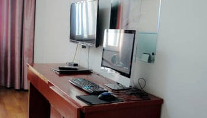 Chambre - Xinshiji Hotel