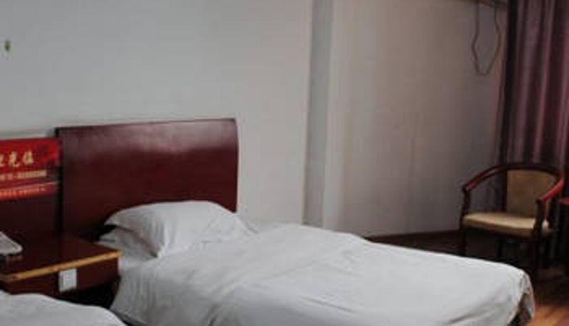 Chambre - Xinshiji Hotel