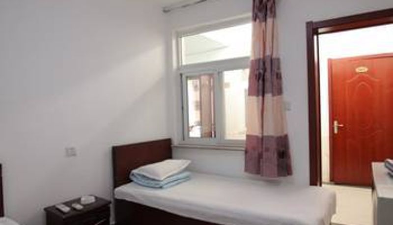 Habitación - Xinli Family Hotel