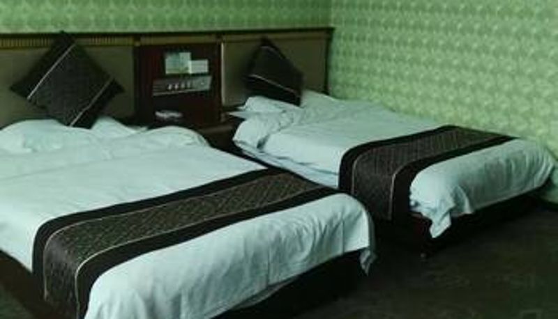 Zimmer - Shengtang Business Hotel (Yan'an Railway Station Branch)