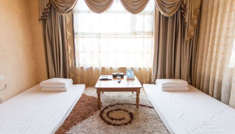 Pokój czteroosobowy - sunshine international hotel