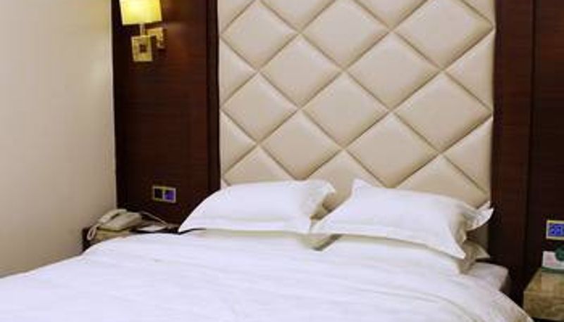 Habitación - Xintehengtai Hotel (Nanlang High speed Railway Station Branch)