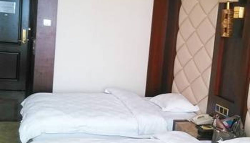 Habitación - Xintehengtai Hotel (Nanlang High speed Railway Station Branch)