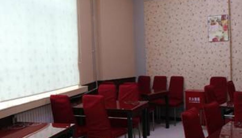 Salle de petit-déjeuner dans le restaurant - Pebble Motel (Daqing Saltu)
