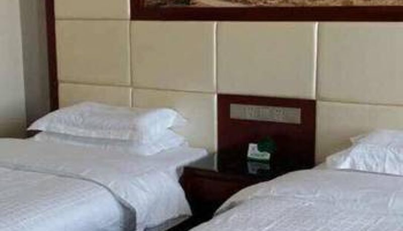 Zimmer - Xinduo Jiatu Hotel (Xinyuan County Hometown Good Commercial Plaza Store)