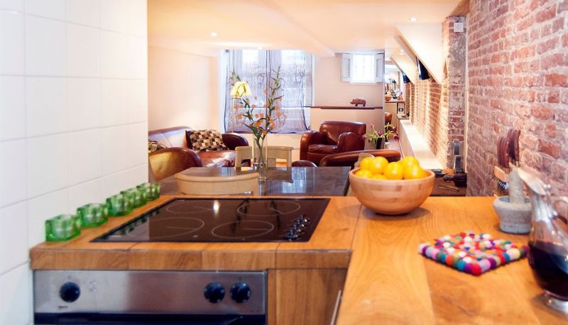 Kitchen area in the room - Oak and Marble Residence