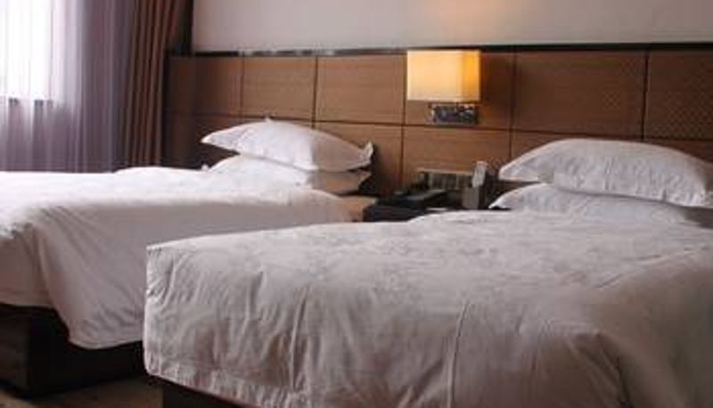 Habitación - Unity Sunshine Hotel