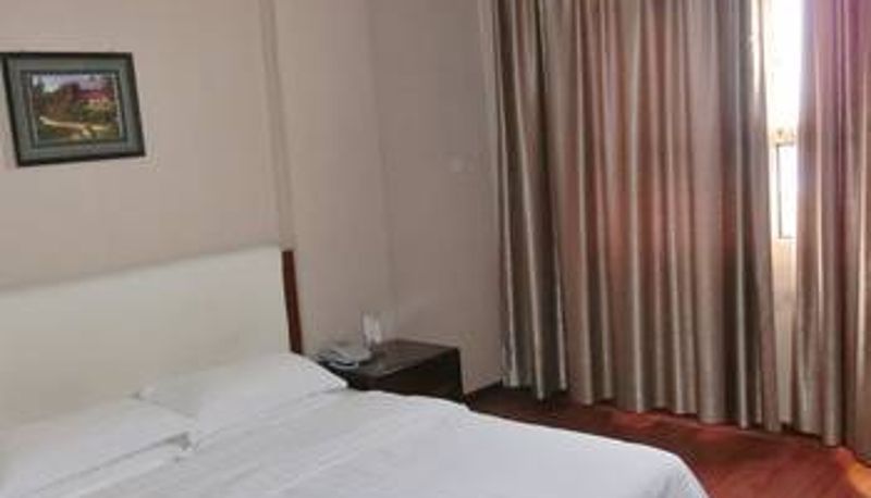 Zimmer - Shangyite Chain Hotel (Huangzhou Wanda Store)