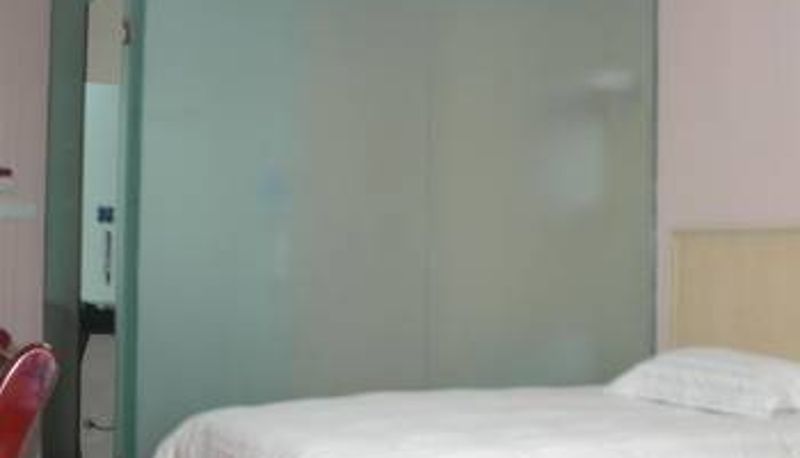 Chambre - 十堰心纳海商务宾馆