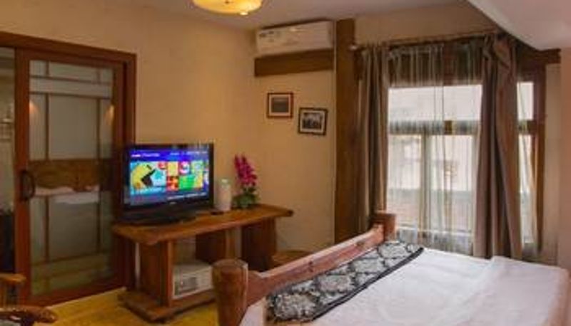 Habitación - Lijiang Golden Sunshine Boutique Hotel