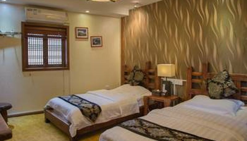 Habitación - Lijiang Golden Sunshine Boutique Hotel