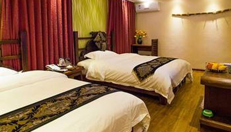 Habitación - Lijiang Golden Sunshine Boutique Hotel