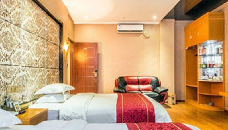 Zimmer - Kaiyue Business Hotel