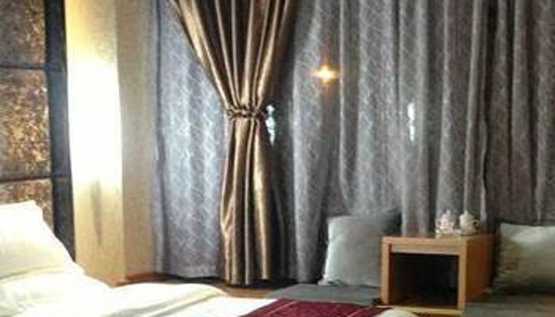 Zimmer - Kaiyue Business Hotel