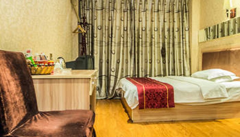 Zimmer - Kaiyue Business Hotel