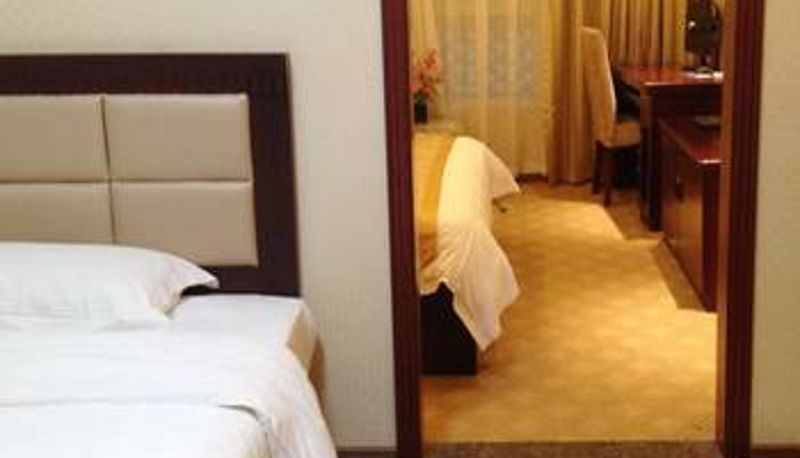 Zimmer - Tianhao Business Hotel (Gaokezhan Building Materials City Store)