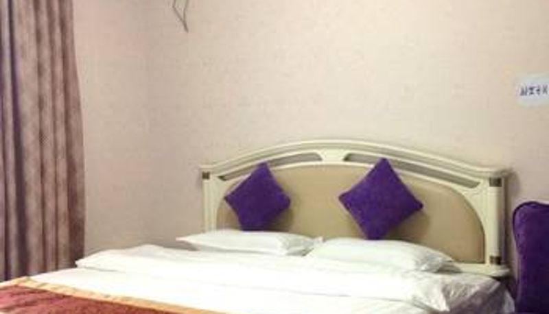 Zimmer - Haitian Fashion Hotel Apartment